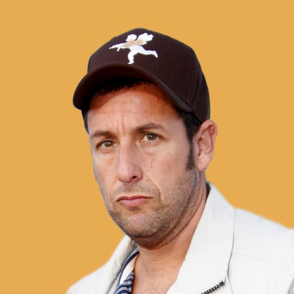 a man wearing a hat and a tie.