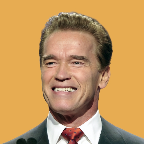 Arnold schwarzenegger is smiling in front of an orange background.|a black car parked in front of a building.