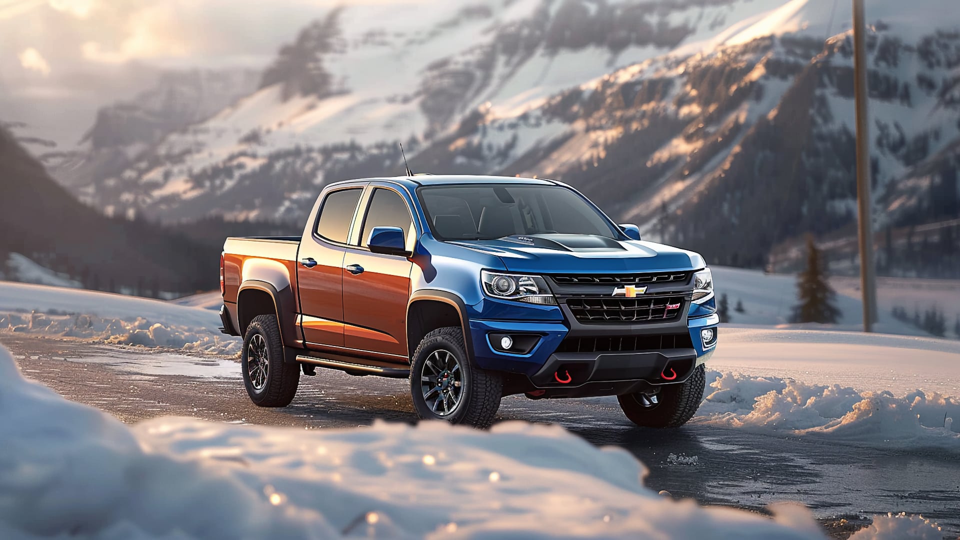 The 2019 Chevrolet Colorado is cruising down a snowy road.|a white truck parked in a parking lot.