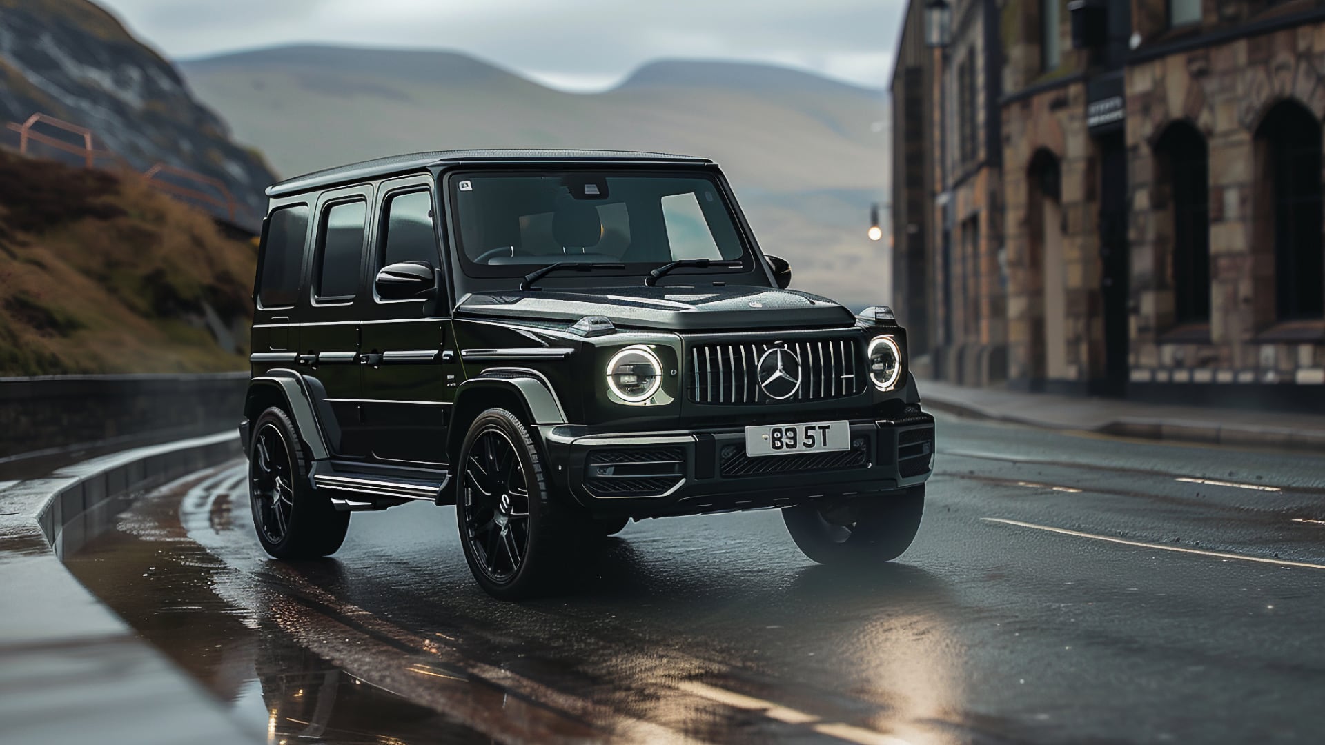 The Mercedes G Wagon is driving down a wet road.|a blue mercedes benz benz benz benz benz benz benz benz benz benz benz benz benz.