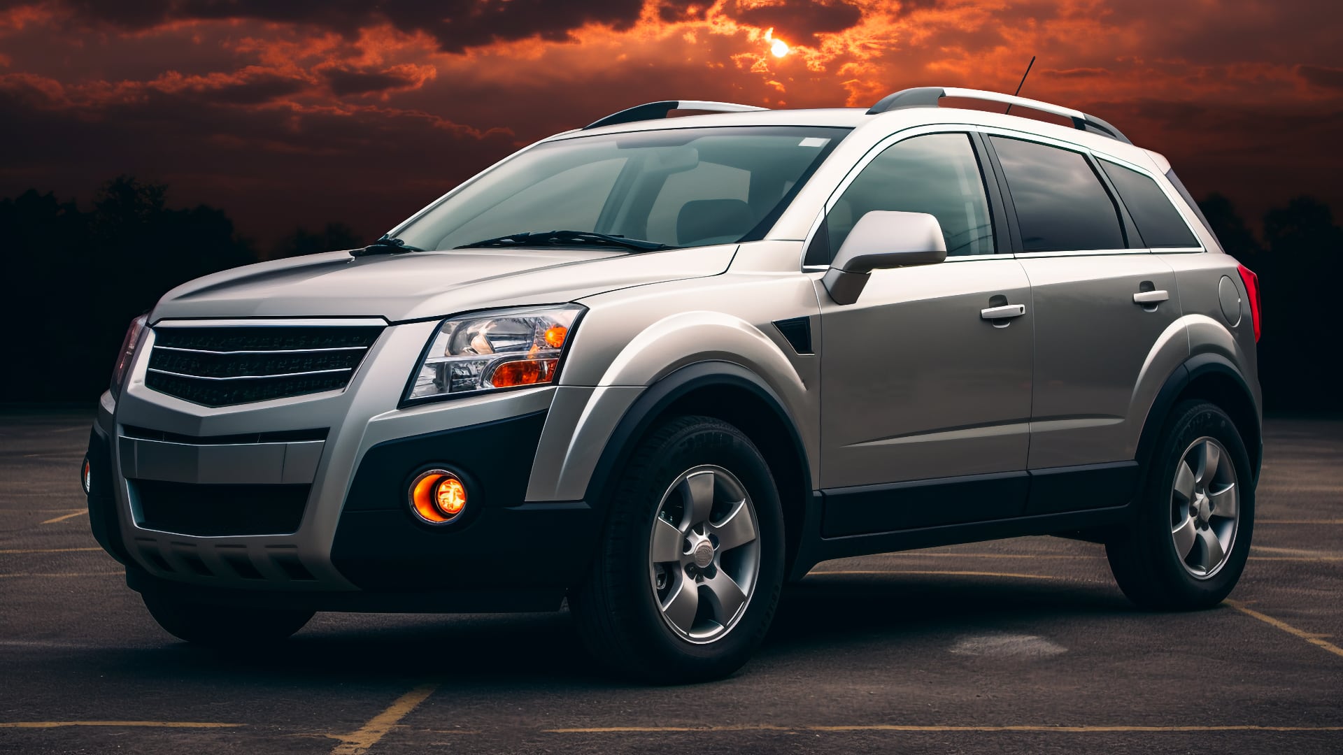 A silver Saturn Vue SUV is parked in a parking lot.|a silver suv parked in a parking lot.