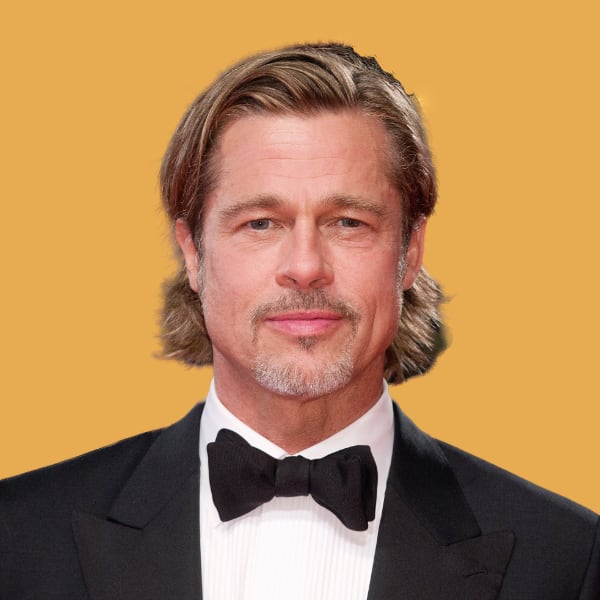 a man wearing a tuxedo and a bow tie.
