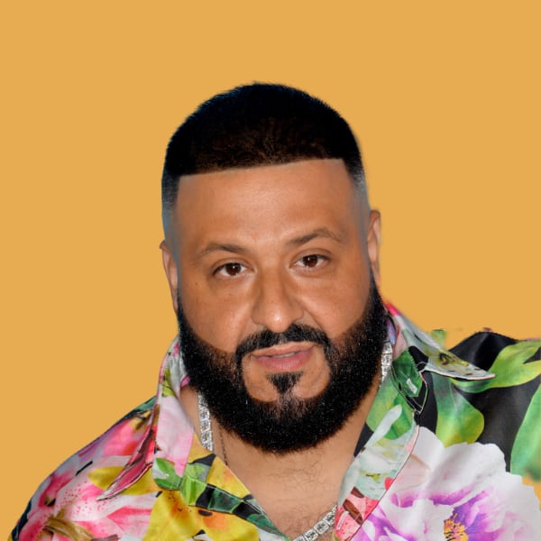a man with a beard wearing a flower shirt.