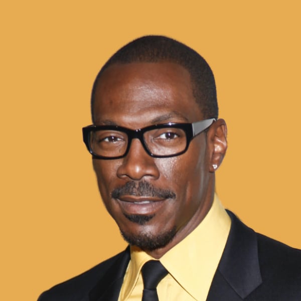 a man in a suit and tie wearing glasses.