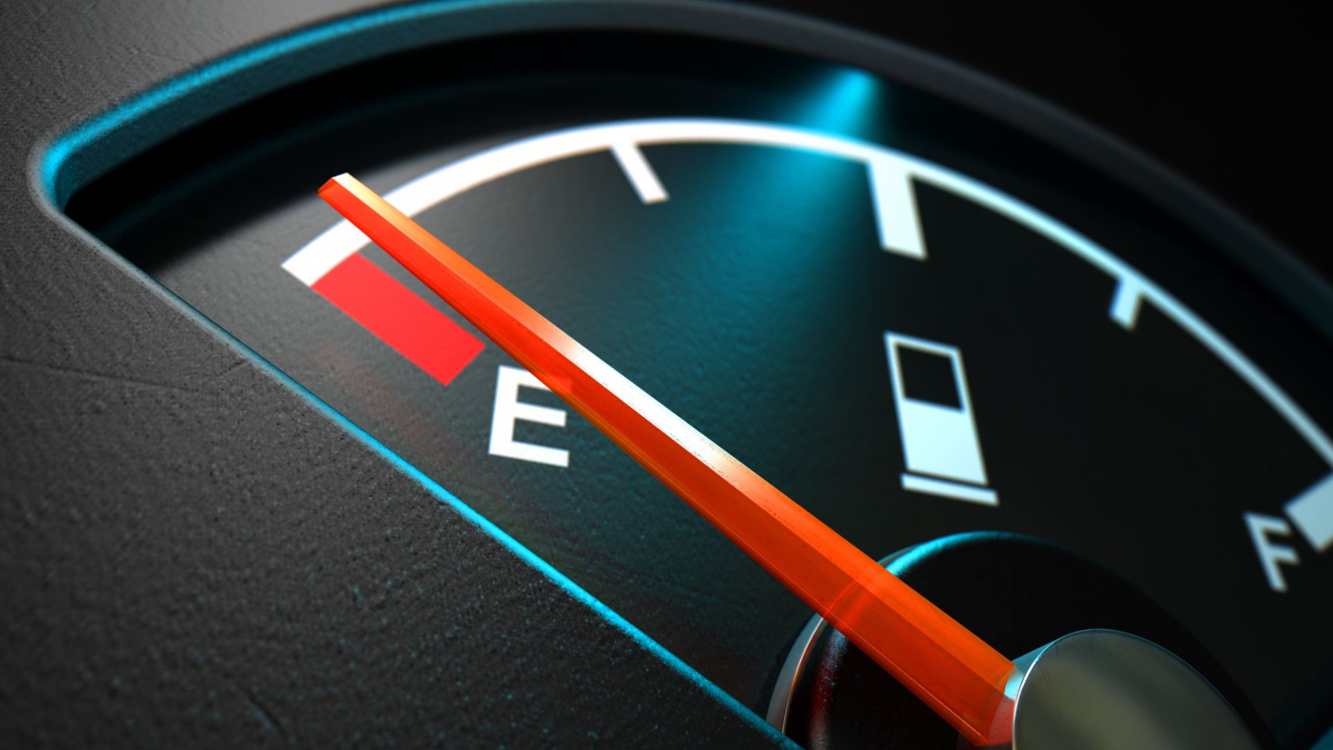 a close up of a speedometer on a car.|a person is working on a car's electrical panel.