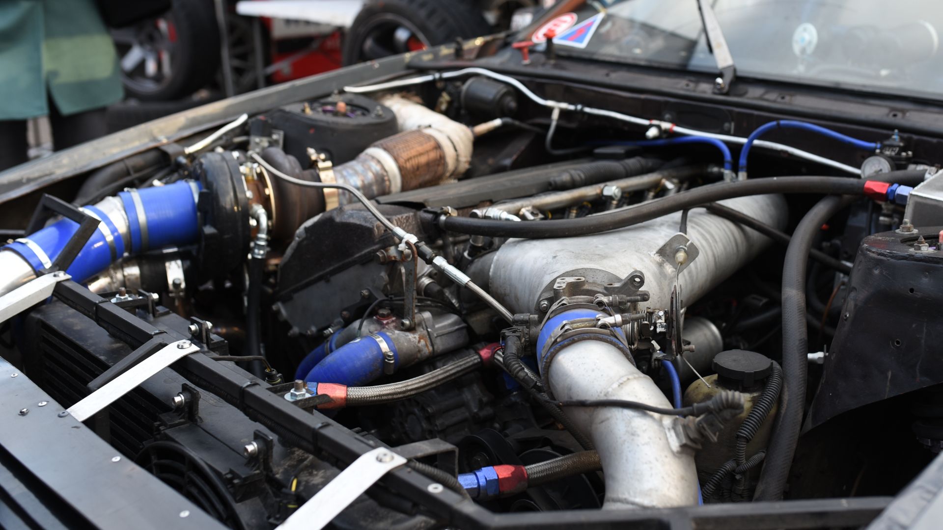 the engine compartment of a car is shown.