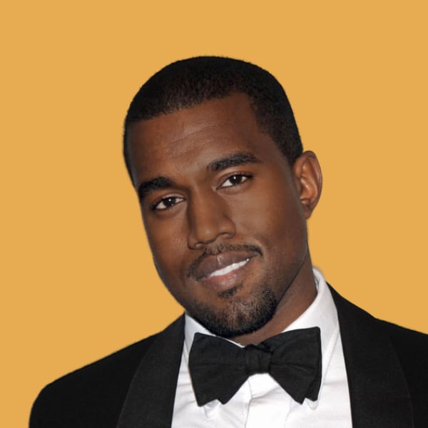 a man wearing a tuxedo and a bow tie.
