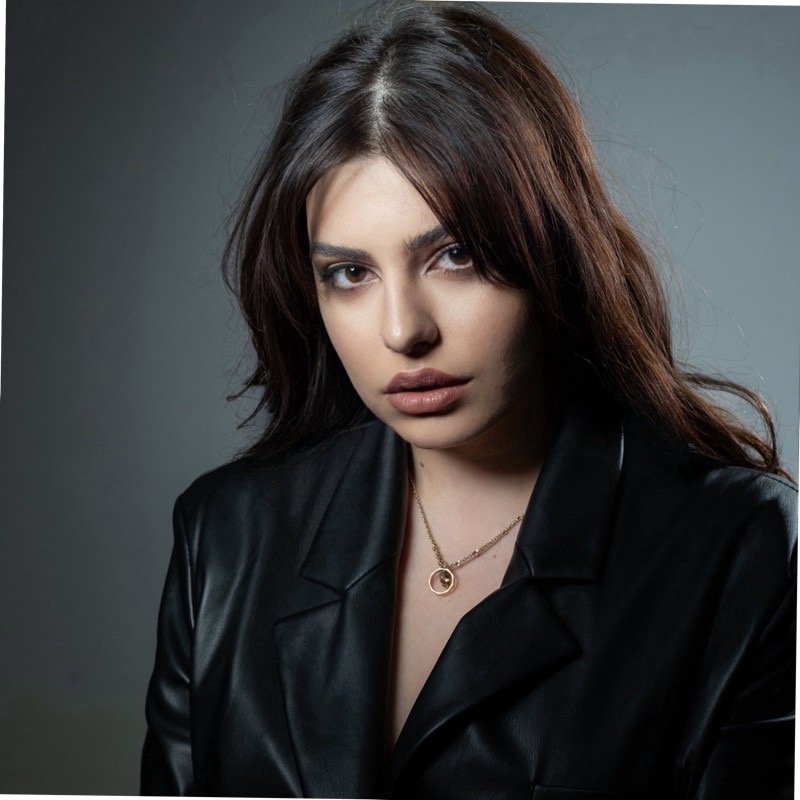 Lilit Farmazian in a black leather blazer.