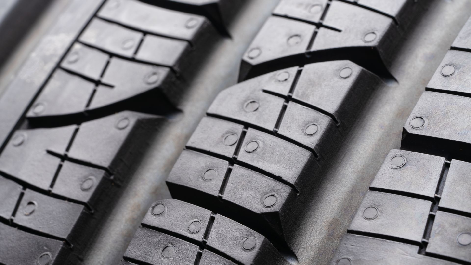 a close up of a tire on a car.