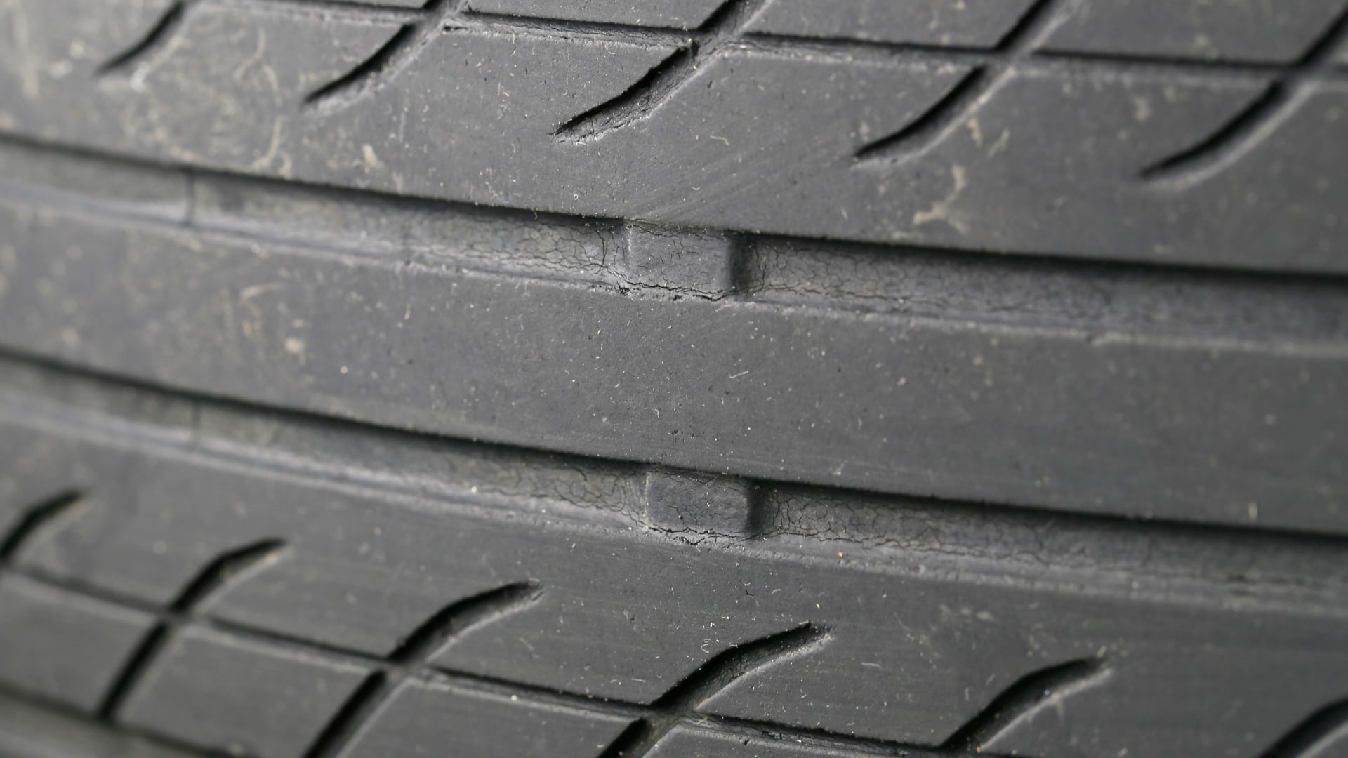 a close up of a tire on a car.
